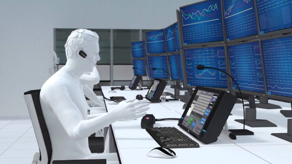 3D rendering of a control-room operator at a multi-screen trader voice console